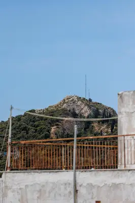 a mountain sitting on top of a building at Penthouse Anneliese in Athens