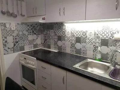 a kitchen with a sink and a counter top at Kipseli house in Athens
