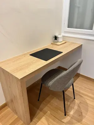 a wooden desk with a chair in a room at Central44 Luxury Apartment Ermou in Athens