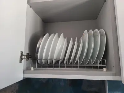 a row of surfboards are lined up in a rack at Bovis Apartments #2 in Porto Rafti