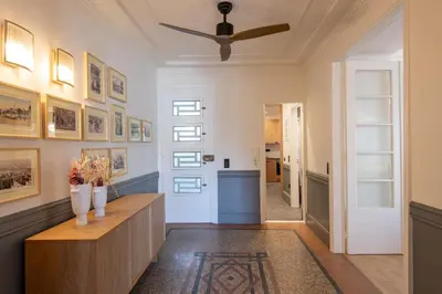 a hallway of a home with a ceiling fan at DIOS Zeus Temple View 1 Bedroom Apartment in Athens
