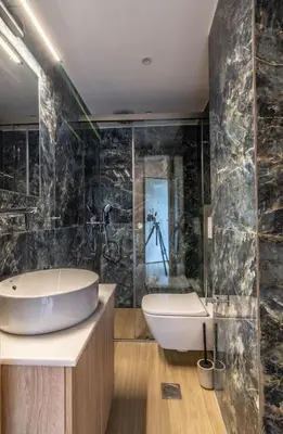a bathroom with a tub and a sink and a toilet at Quiet Studio With Free Parking in Athens