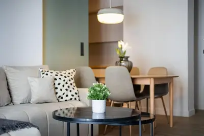a living room with a couch and a table at Nostalgia 1-Bedroom Apartment in Athens in Athens