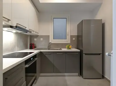 a kitchen with a refrigerator and a sink at Marnis10 5th Right in Athens