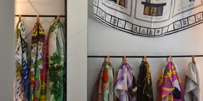 a group of ties hanging on a wall at Anasa Hotel Athens in Athens