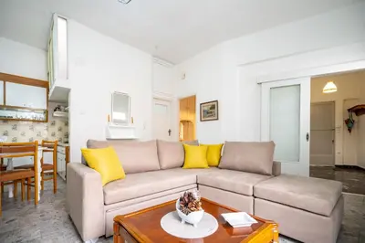 a living room with a couch and a table at Keratsini 2 bedroom 4 pers apart by MPS in Piraeus