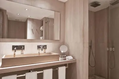 a bathroom with a sink and a shower at The Margi in Athens