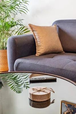 a living room with a couch and a table at Two-Bedroom Apartment in Pagrati in Athens