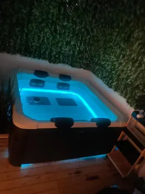 a hot tub in the middle of a room at Vouliagmeni Seaside Luxury Home in Athens