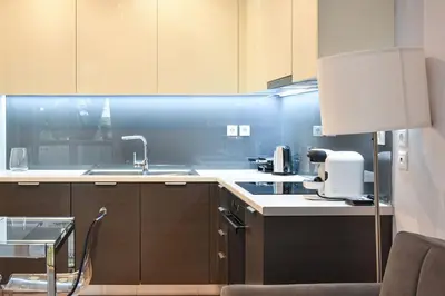 a kitchen with a sink and a counter top at Apartment in Kolonaki in Athens