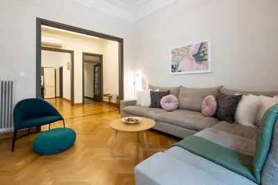 a living room with a couch and a table at Meadows - Luxury 3-Bedroom Apartment in Athens in Athens