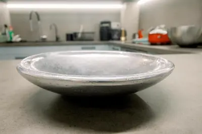a bowl sitting on a counter in a kitchen at Blue harbour house - style meets comfort in Piraeus