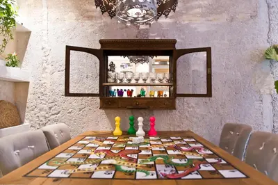 a dining room table with a table cloth on it at Boutique apartment near Acropolis in Athens