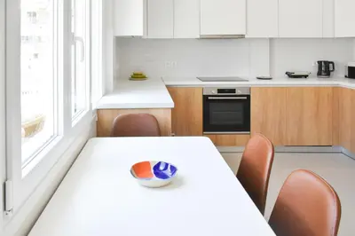 a kitchen with a table with a bowl on it at Spacious apartment in Athens in Athens