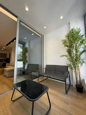 a living room with a bench and a table at PortStay - Complex N71 in Piraeus