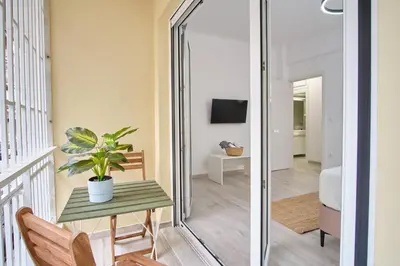 a room with a table and a mirror at Central Cozy House in Athens