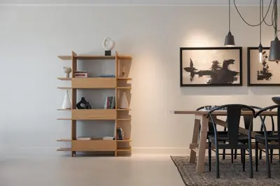 a dining room with a table and black chairs at Casa Amalia in Aghia Marina