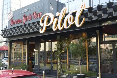 a restaurant with a sign on the front of it at Acropolis Landscape in Athens