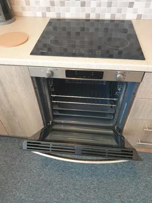 an oven with its door open in a kitchen at Lavender-Ryan spacious apartment for live and work in heart of Athens in Athens