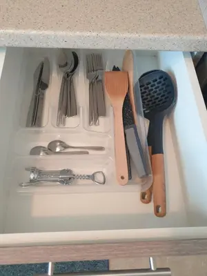 a drawer filled with utensils in a kitchen sink at Lavender-Ryan spacious apartment for live and work in heart of Athens in Athens