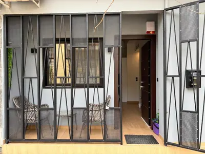 a dog in a cage in a house at K43 Brand-New Stylish - Cloud9 in the city in Athens
