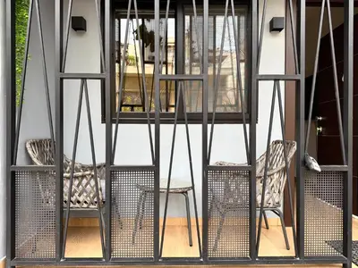 two chairs and a table on a patio at K43 Brand-New Stylish - Cloud9 in the city in Athens