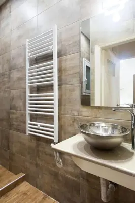 a bathroom with a bowl sink and a mirror at A pleasant stay near to Acropoli 1B in Athens