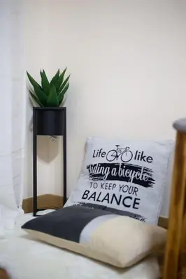 a pillow that says life is like riding a bicycle to keep your balance at A pleasant stay near to Acropoli 1B in Athens
