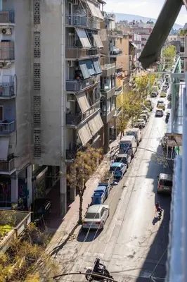an overhead view of a city street with parked cars at Elegant studio next to Acropolis 2 in Athens