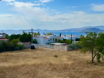 a house with a view of the water at Saronida365 Sea & Sunset view in Saronida