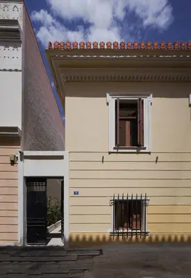 a building with a window on the side of it at Plaka House - Boutique Apartments in Athens