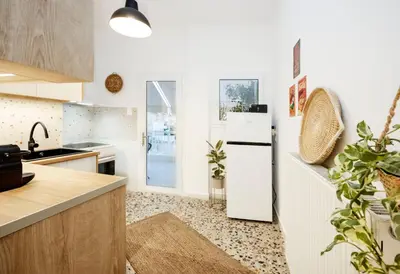 a kitchen with a refrigerator and a counter top at S37 Acropolis View in Athens