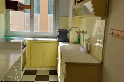 a small kitchen with a sink and a window at Dalia Apartment- 3 BD,1 BATH in Athens