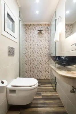 a bathroom with a toilet and a shower and a sink at A comfortable small studio nearby Acropolis 2 in Athens