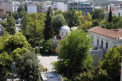 an aerial view of a building with a dome at A comfortable small studio nearby Acropolis 202 in Athens