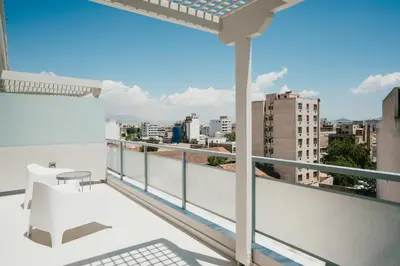 a balcony with a view of the city at Gallery Central Piraeus Port in Piraeus