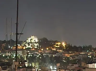 a view of a city at night at Small studio under Acropolis B! in Athens