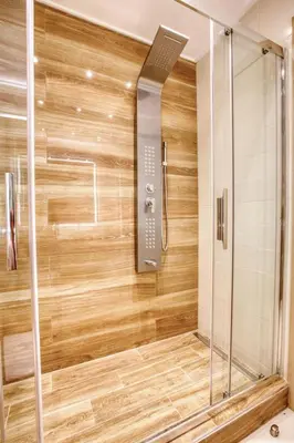 a shower with a glass door in a bathroom at Saronida Hills private Pool in Saronida