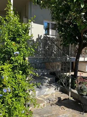 a set of stairs in front of a house at Sirius Escape in Spáta