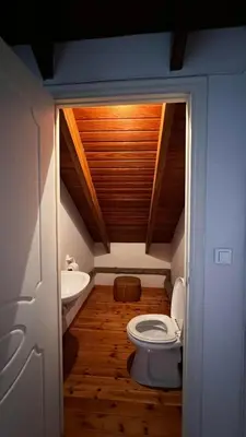 a bathroom with a toilet and a sink at Alexandros suite in Athens