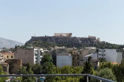 a city with a castle on top of a hill at Special studio in the heart of Athens! in Athens