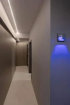 a hallway with a blue light on the wall at Well-designed apartment by the Acropolis GHH in Athens