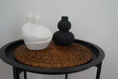a table with two vases sitting on top of it at Urban Apartment Psiri in Athens