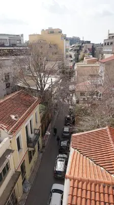 an aerial view of a city with cars parked on a street at Urban Apartment Psiri in Athens