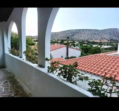 a view of a building with a roof at Sounio Poseidon Villa in Sounio