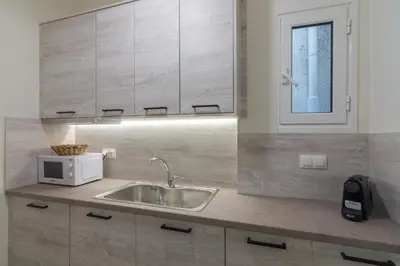 a kitchen with a sink and a microwave at Coloneum 1BD Cozy Apartment in Athens Kolonos in Athens