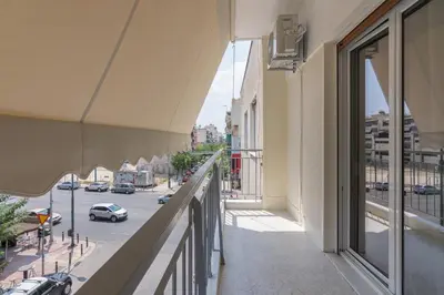 an apartment balcony with a view of a city street at Coloneum 1BD Cozy Apartment in Athens Kolonos in Athens