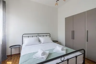 a bedroom with a bed with two white pillows on it at Coloneum 1BD Cozy Apartment in Athens Kolonos in Athens