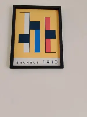 a framed painting of the berlin wall at Midcentury Modern Apartment in Piraeus