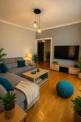 a living room with a couch and a flat screen tv at Sunny Escape in Alimos, close to the beach in Athens